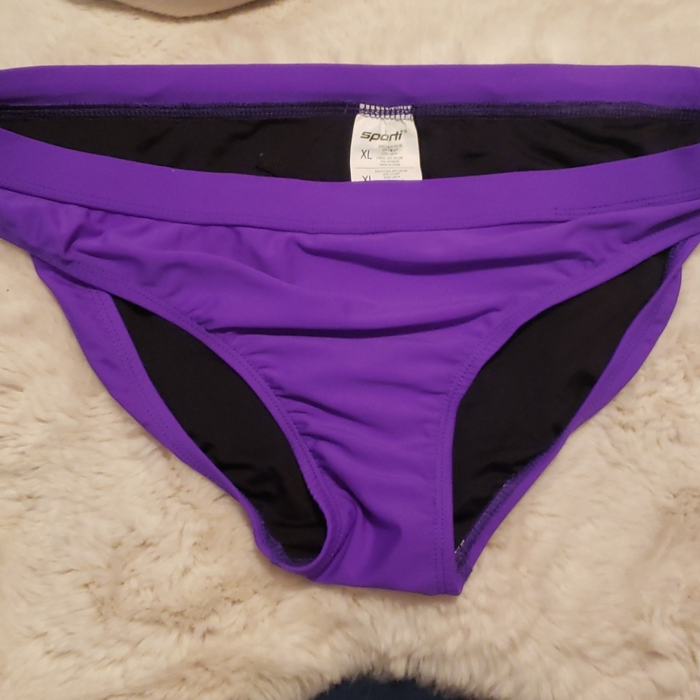 Bright purple bikini bathing suit bottoms